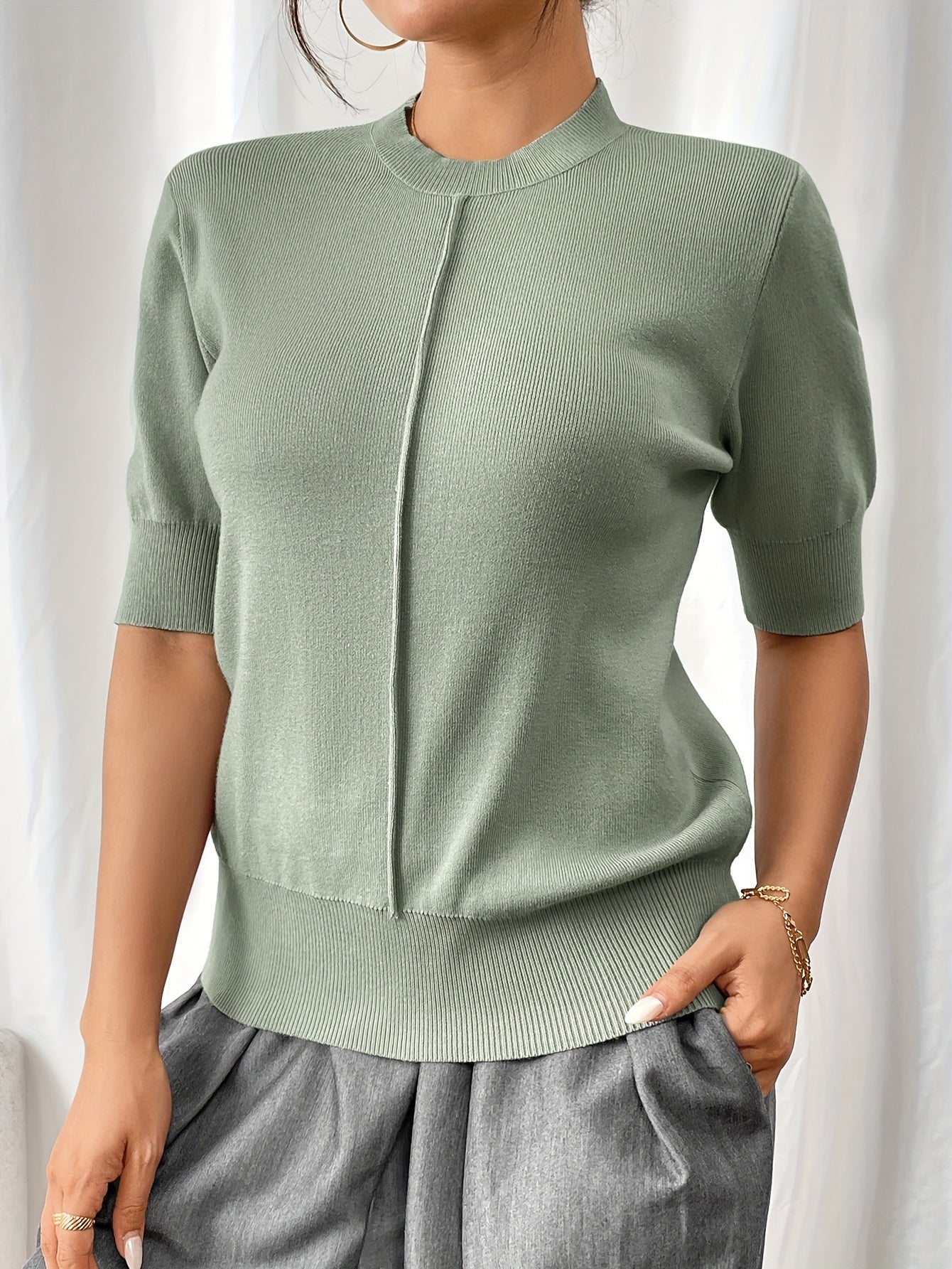 Camisa de punto cuello alto elegante