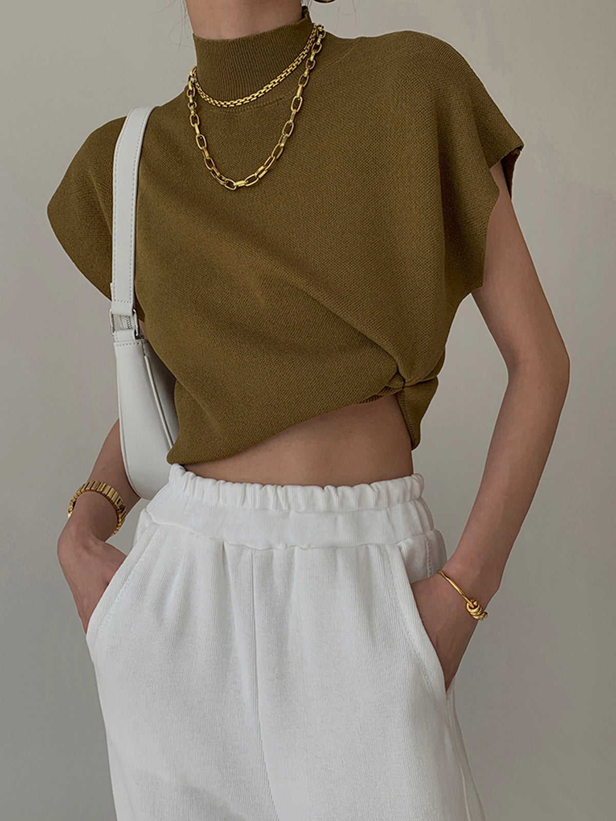 Chaleco de Punto Cuello Alto Mujer Elegante