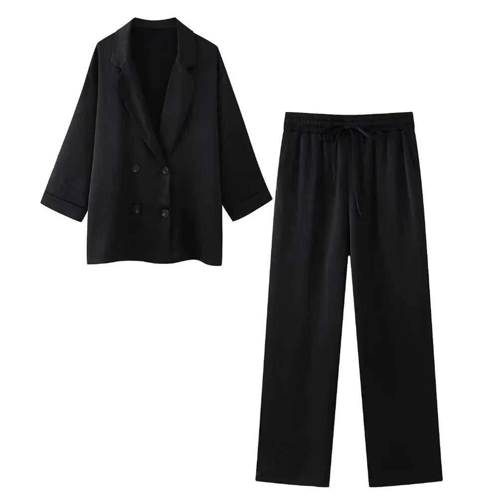 Traje mujer chaqueta cruzada pantalón ancho elegante