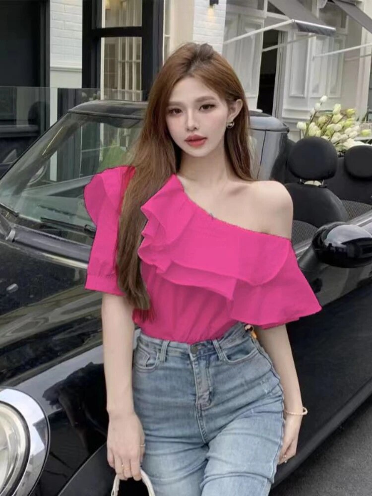 Blusa de moda con un hombro descubierto