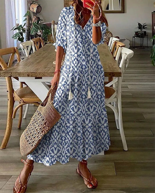 Vestido largo elegante con escote en V y caída suelta - Vestiria