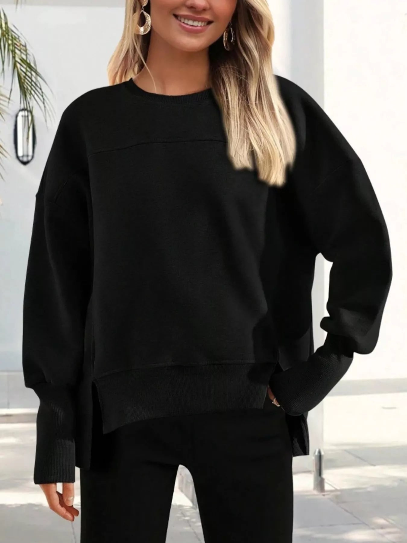 Sudadera deportiva holgada con corte lateral - Vestiria