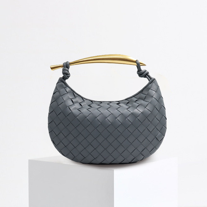 Bolso de mano de cuero artesanal