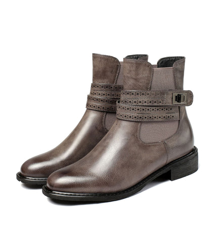 Botas de tacón alto con hebilla elegante