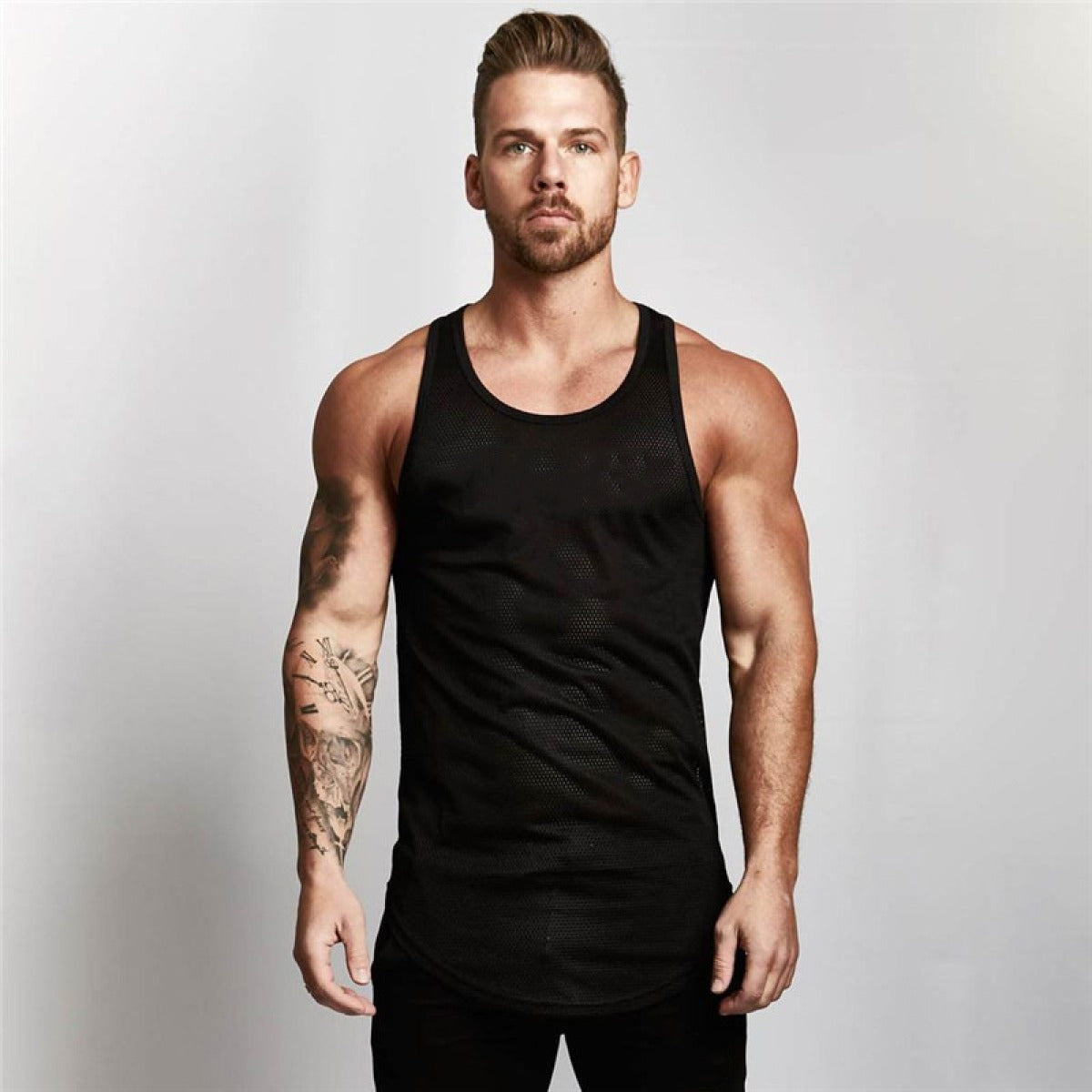 Camiseta deportiva sin mangas transpirable hombre