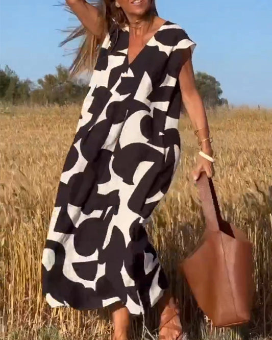 Vestido Estampado Florado con Escote en V Elegante - Vestiria