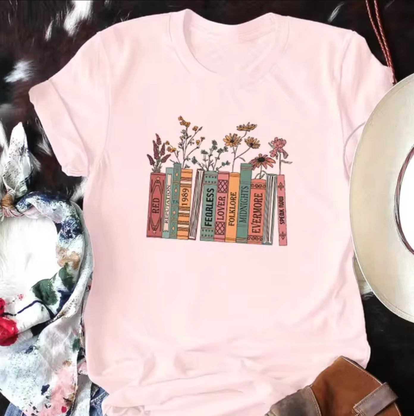 Camiseta Estampada Libros y Flores Fem - Vestiria