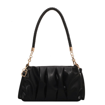 Bolso bandolera elegante con textura suave