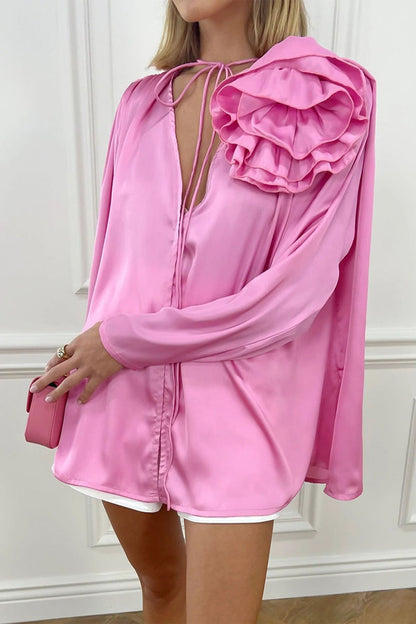 Blusa de encaje rosa con flores y cuello en V