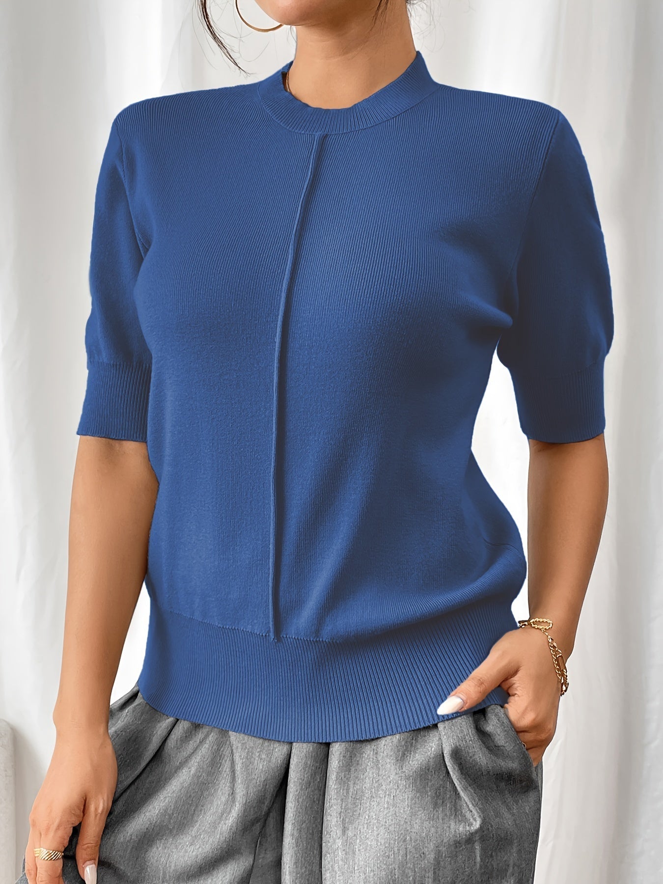 Camisa de punto cuello alto elegante