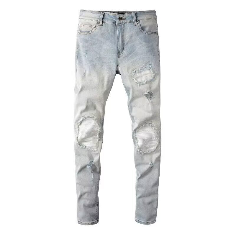 Pantalones vaqueros ajustados con roturas