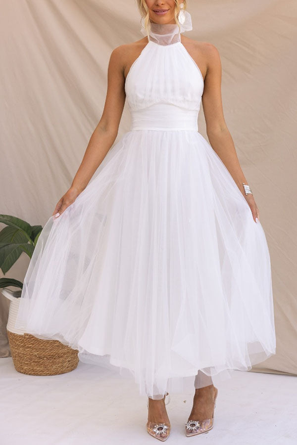 Vestido Midi Elegante con Escote Halter y Falda Aireada
