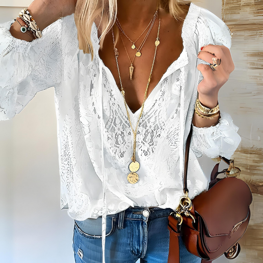 Blusa femenina con encaje y lazo elegante