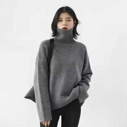 Sudadera cuello alto amplia y cómoda