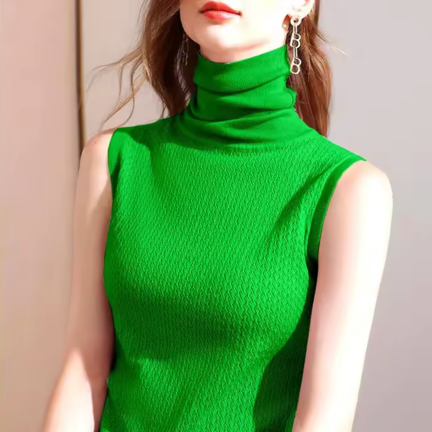 Top de punto cuello alto sin mangas