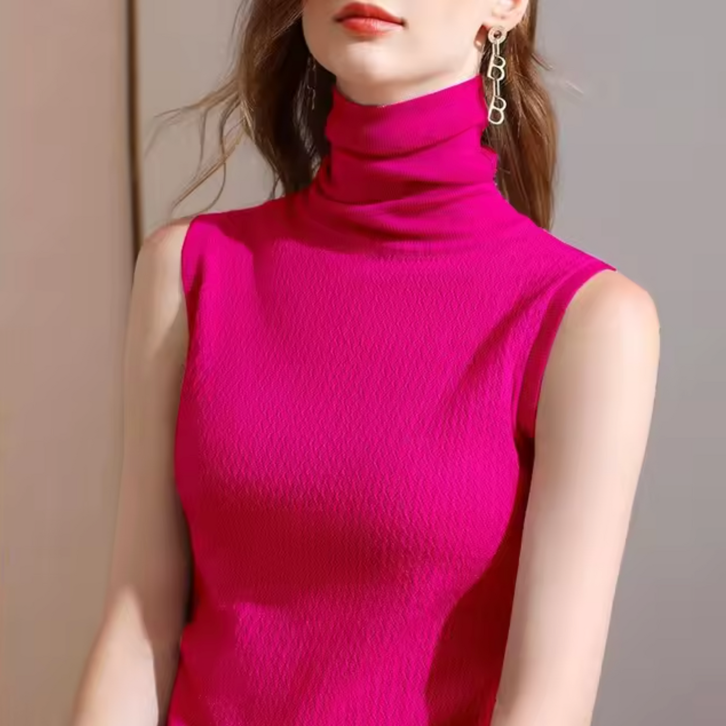 Top de punto cuello alto sin mangas