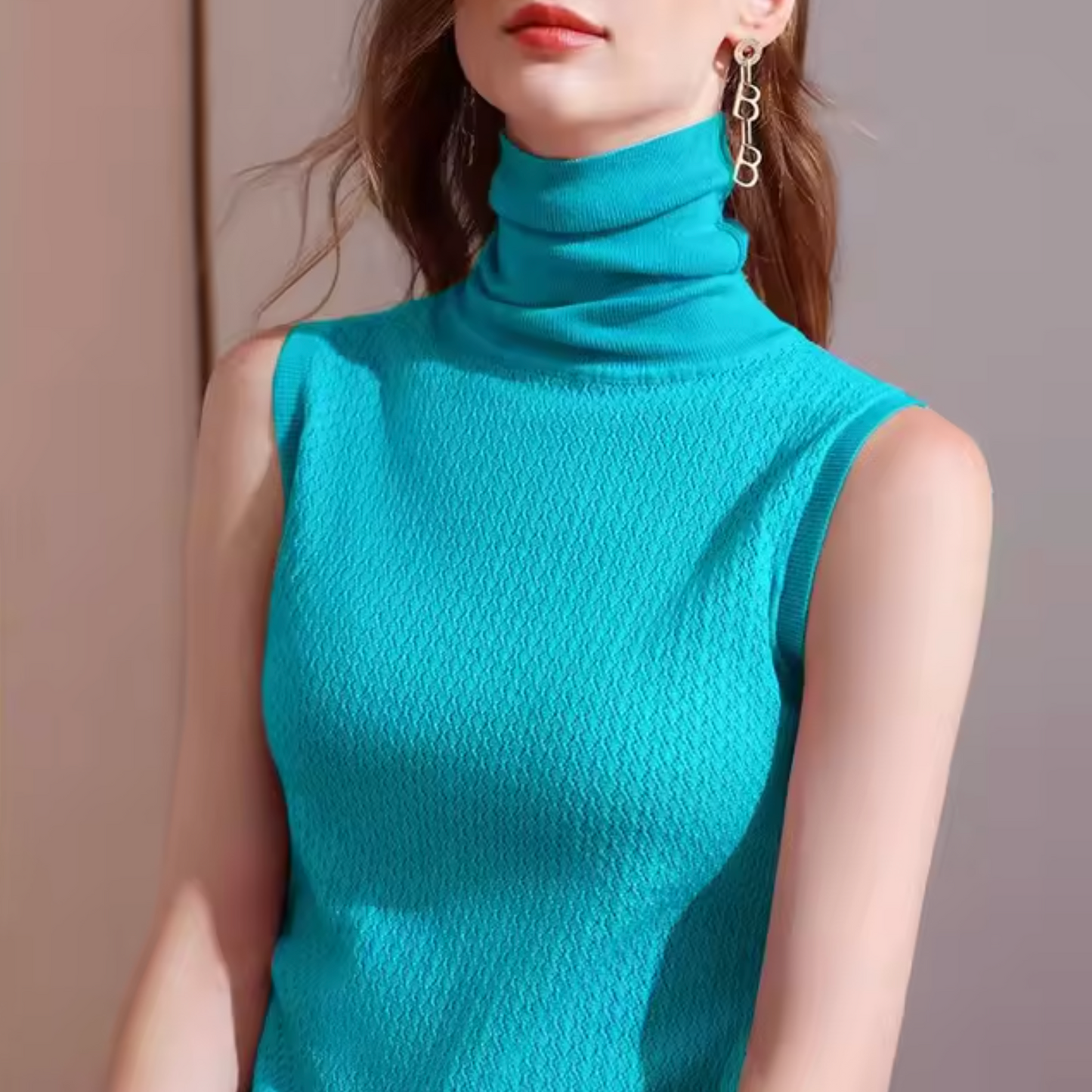 Top de punto cuello alto sin mangas