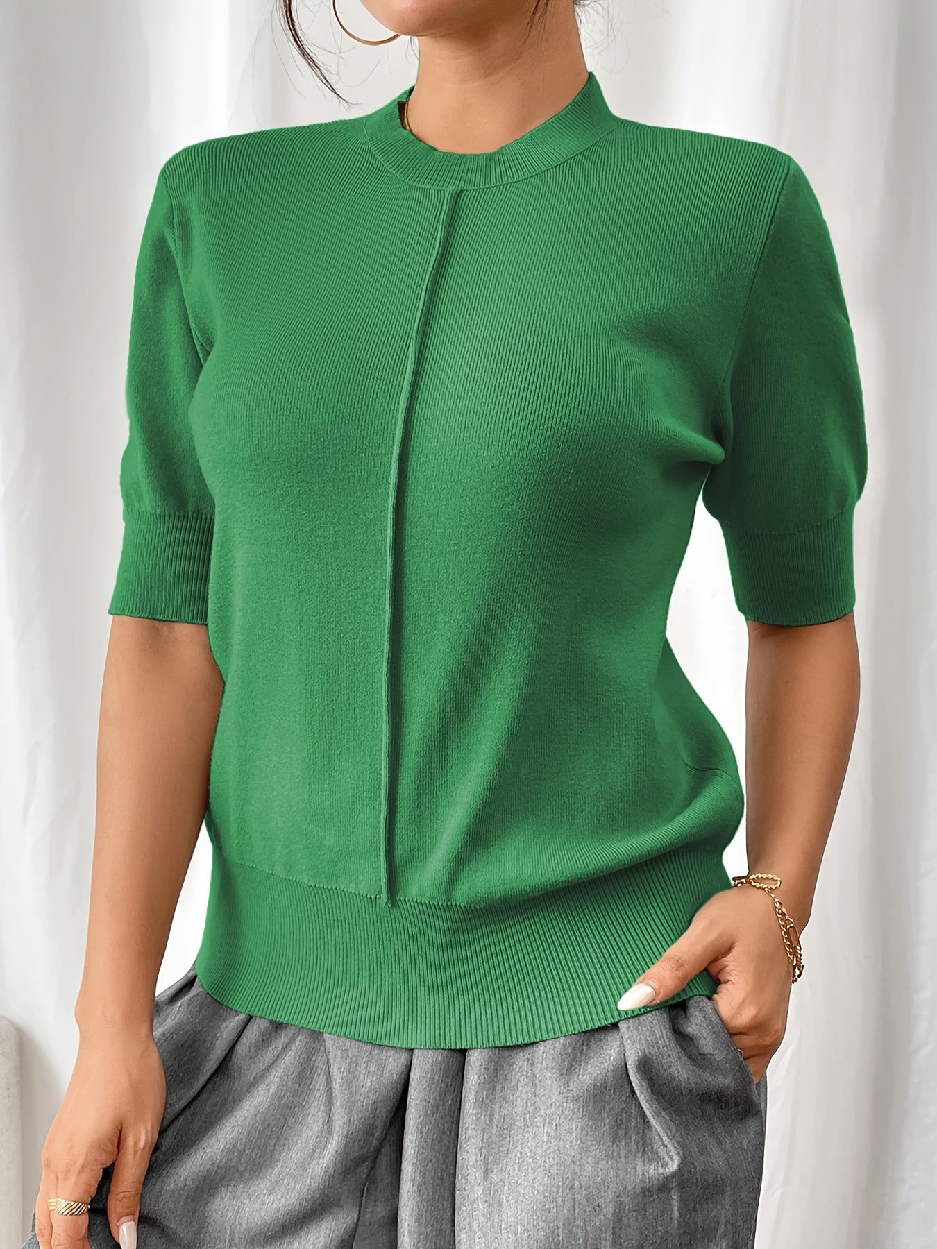 Camisa de punto cuello alto elegante