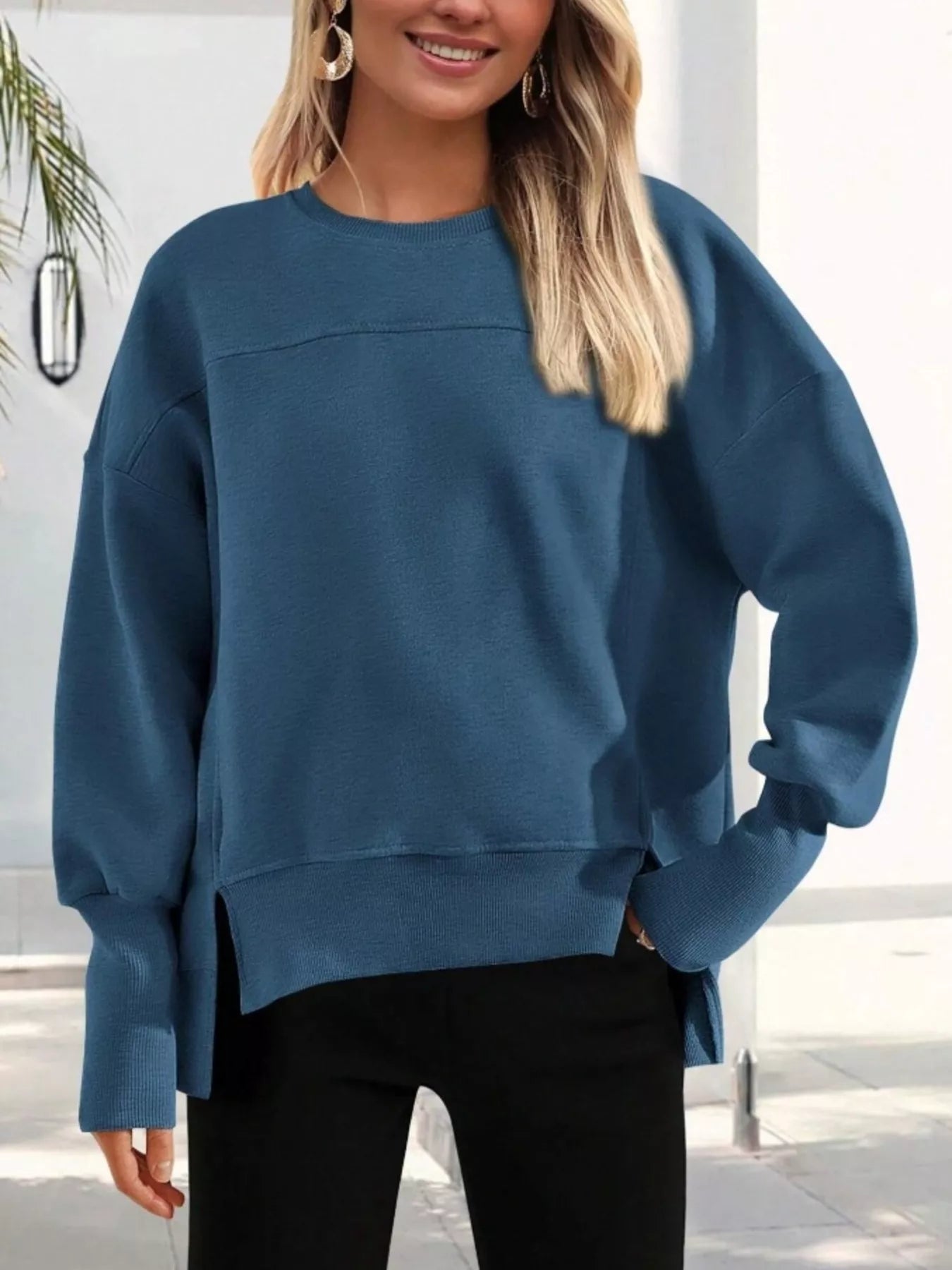Sudadera deportiva holgada con corte lateral