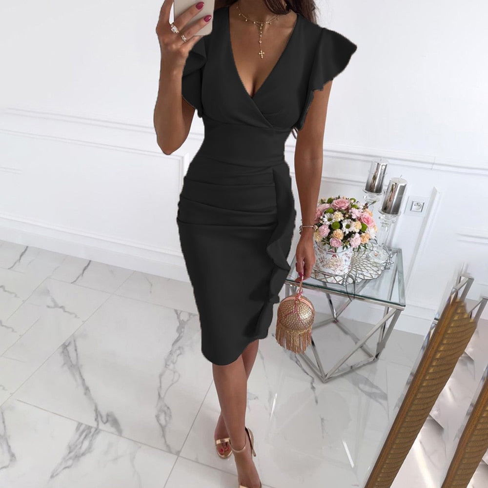 Vestido ceñido con volantes y manga corta