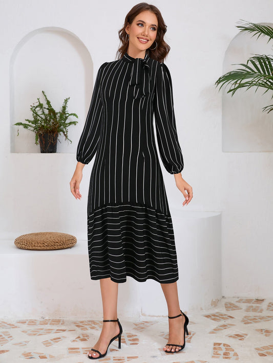 Vestido Midi Elegante con Lazo y Mangas Largas - Vestiria