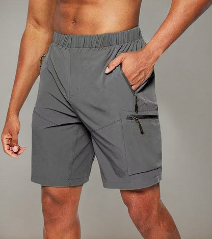 Pantalón corto deportivo hombre con bolsillo cremallera