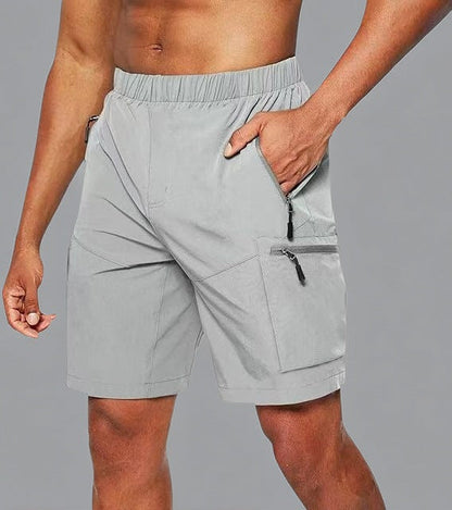 Pantalón corto deportivo hombre con bolsillo cremallera