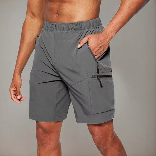 Pantalón corto deportivo hombre con bolsillo cremallera - Vestiria
