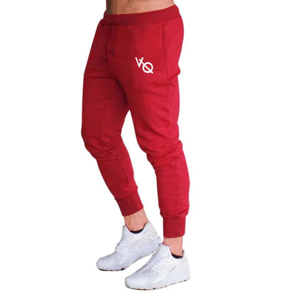 Pantalones deportivos ajustados hombre tobillo elástico