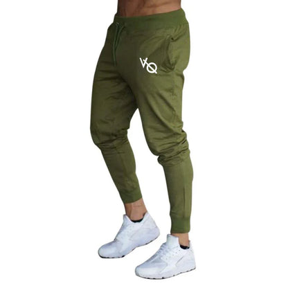 Pantalones deportivos ajustados hombre tobillo elástico