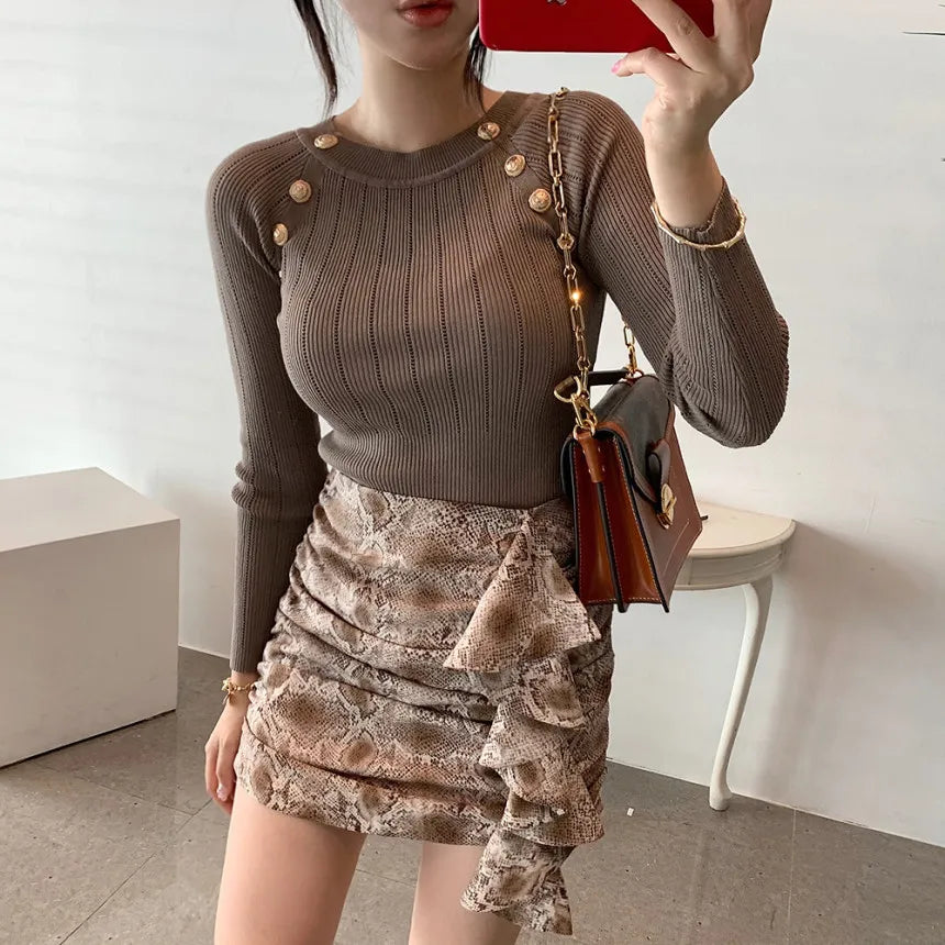 Jersey de punto con botones decorativos
