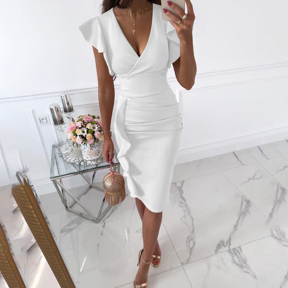 Vestido ceñido con volantes y manga corta