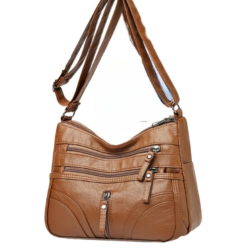 Bolso bandolera elegante con cremallera y detalles femeninos - Vestiria