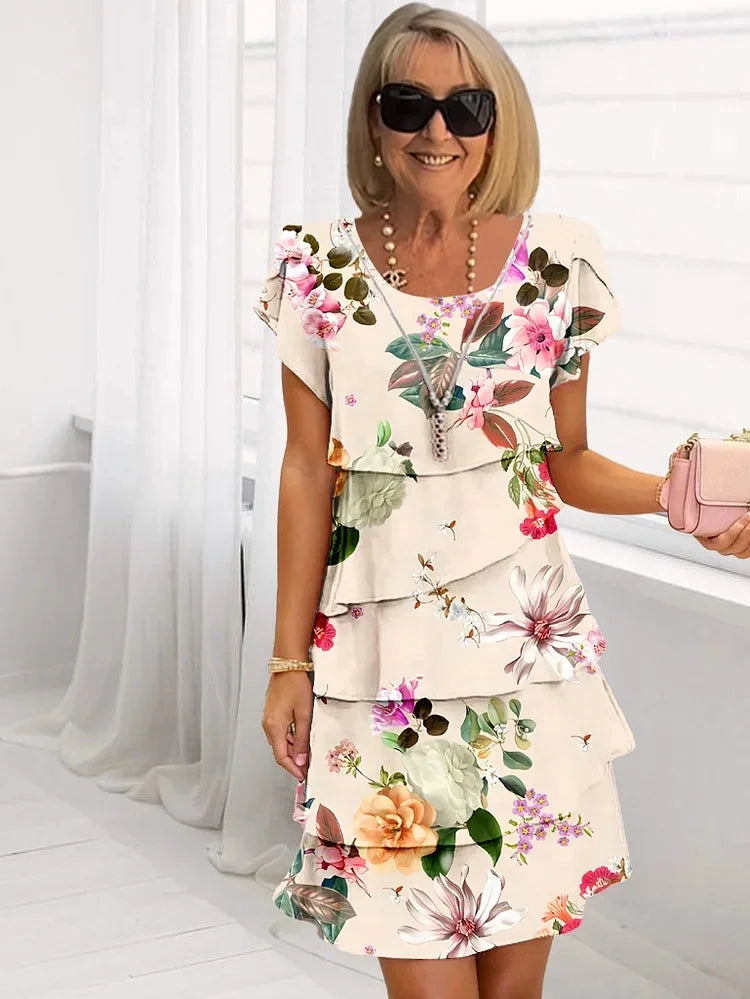 Vestido de boda invitada flores elegante