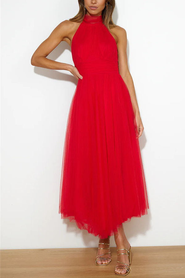 Vestido Midi Elegante con Escote Halter y Falda Aireada