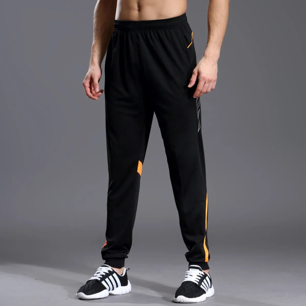 Pantalón deportivo hombre poliéster respirable estilo running - Vestiria