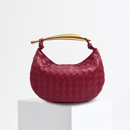 Bolso de mano de cuero artesanal