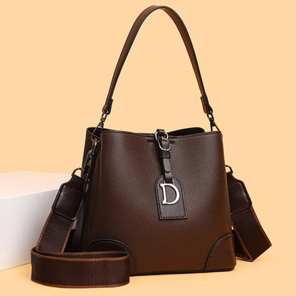 Bolso bandolera mujer estilo bucket cuero sintético bicolor