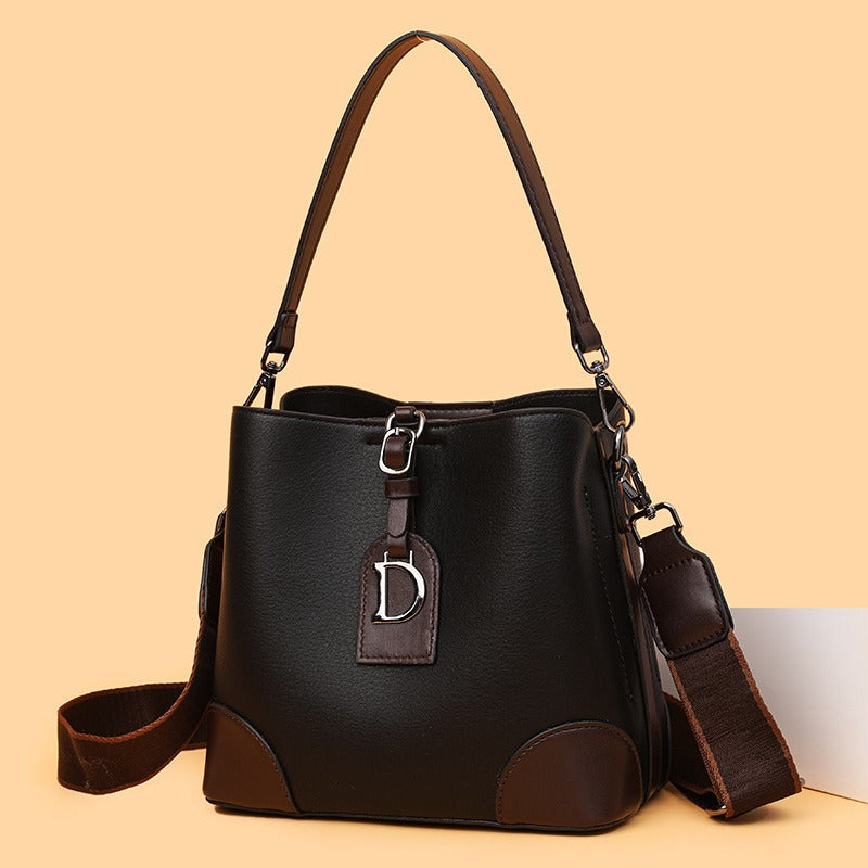 Bolso bandolera mujer estilo bucket cuero sintético bicolor - Vestiria