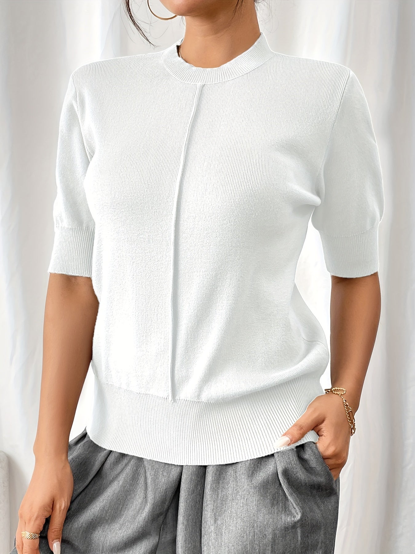 Camisa de punto cuello alto elegante