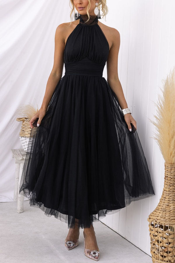 Vestido Midi Elegante con Escote Halter y Falda Aireada