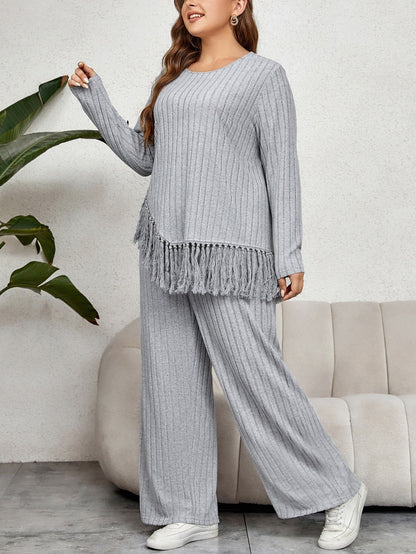 Conjunto suéter y pantalones de punto suave y cómodo