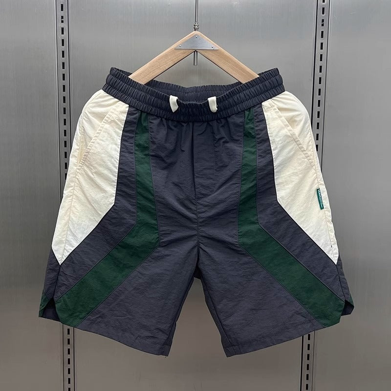 Pantalones cortos deportivos hombre con detalles contrastados - Vestiria