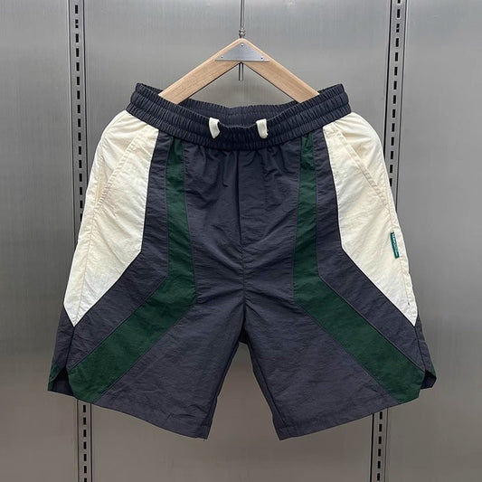 Pantalones cortos deportivos hombre con detalles contrastados - Vestiria