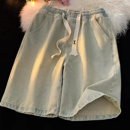 Pantalones cortos vaqueros elásticos ajustables