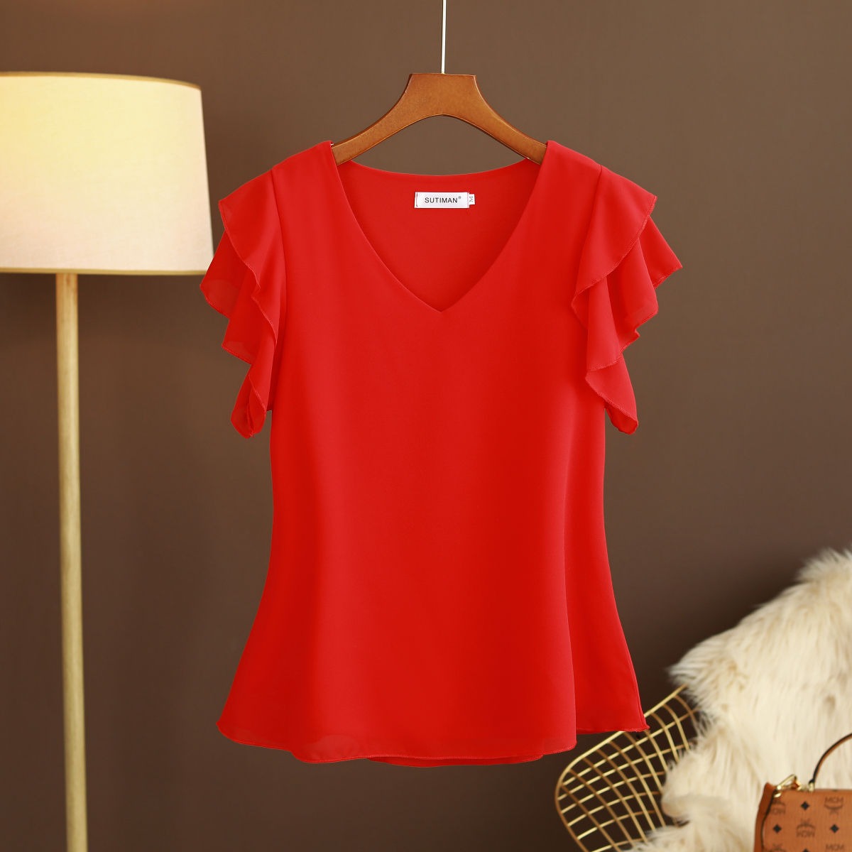 Blusa de mujer gasa ligera con volantes y escote pico