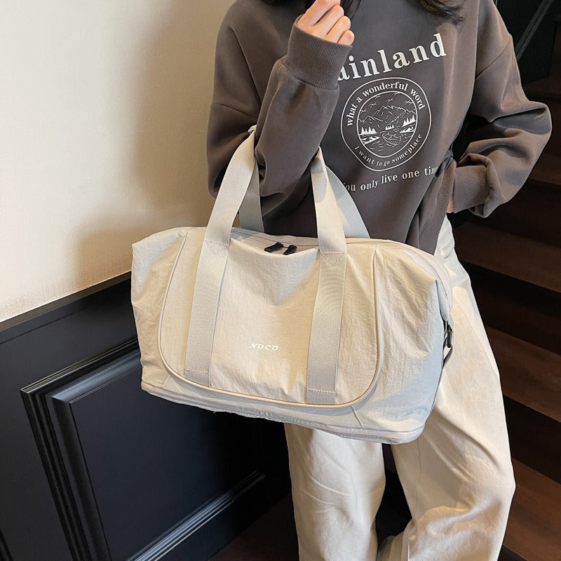 Bolso de mano deportivo para mujer de tejido resistente