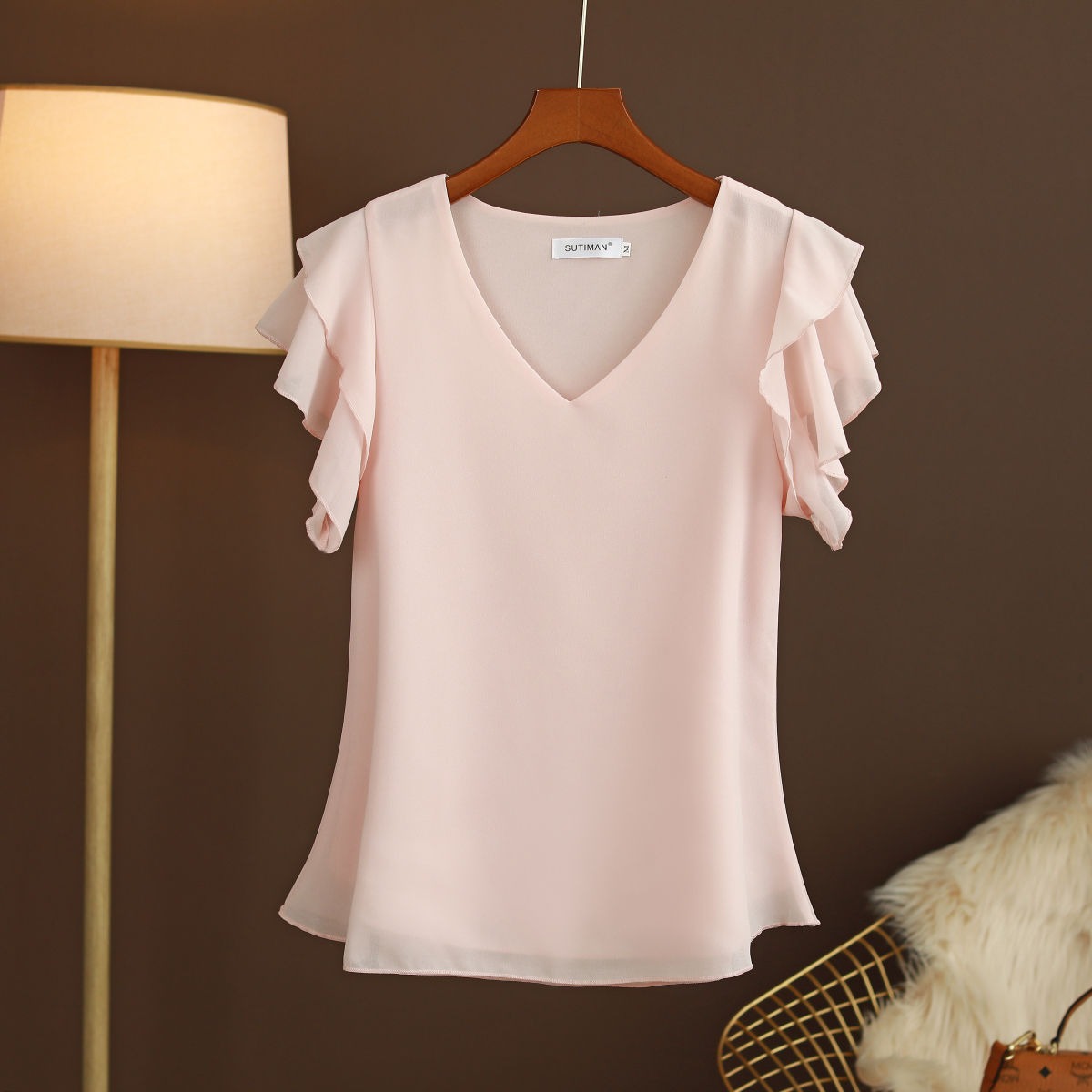 Blusa de mujer gasa ligera con volantes y escote pico