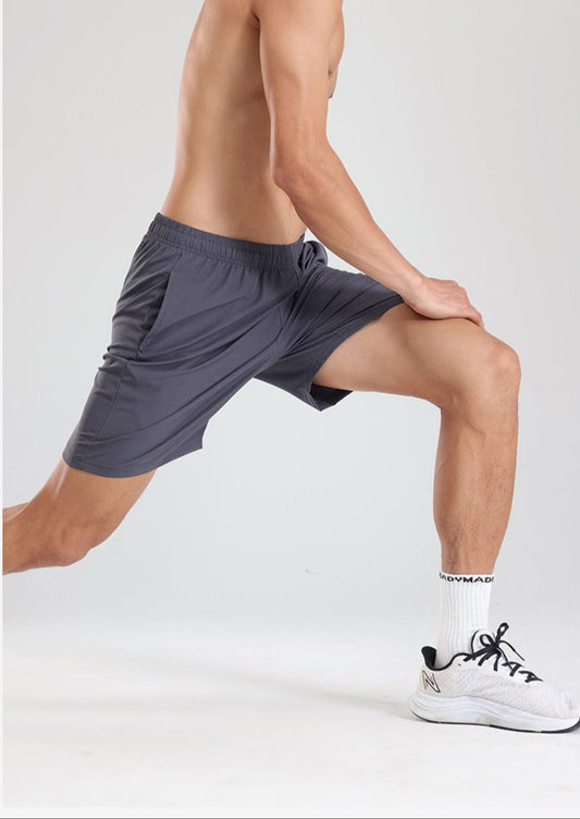 Pantaloneta deportiva hombre transpirable corte deportivo - Vestiria