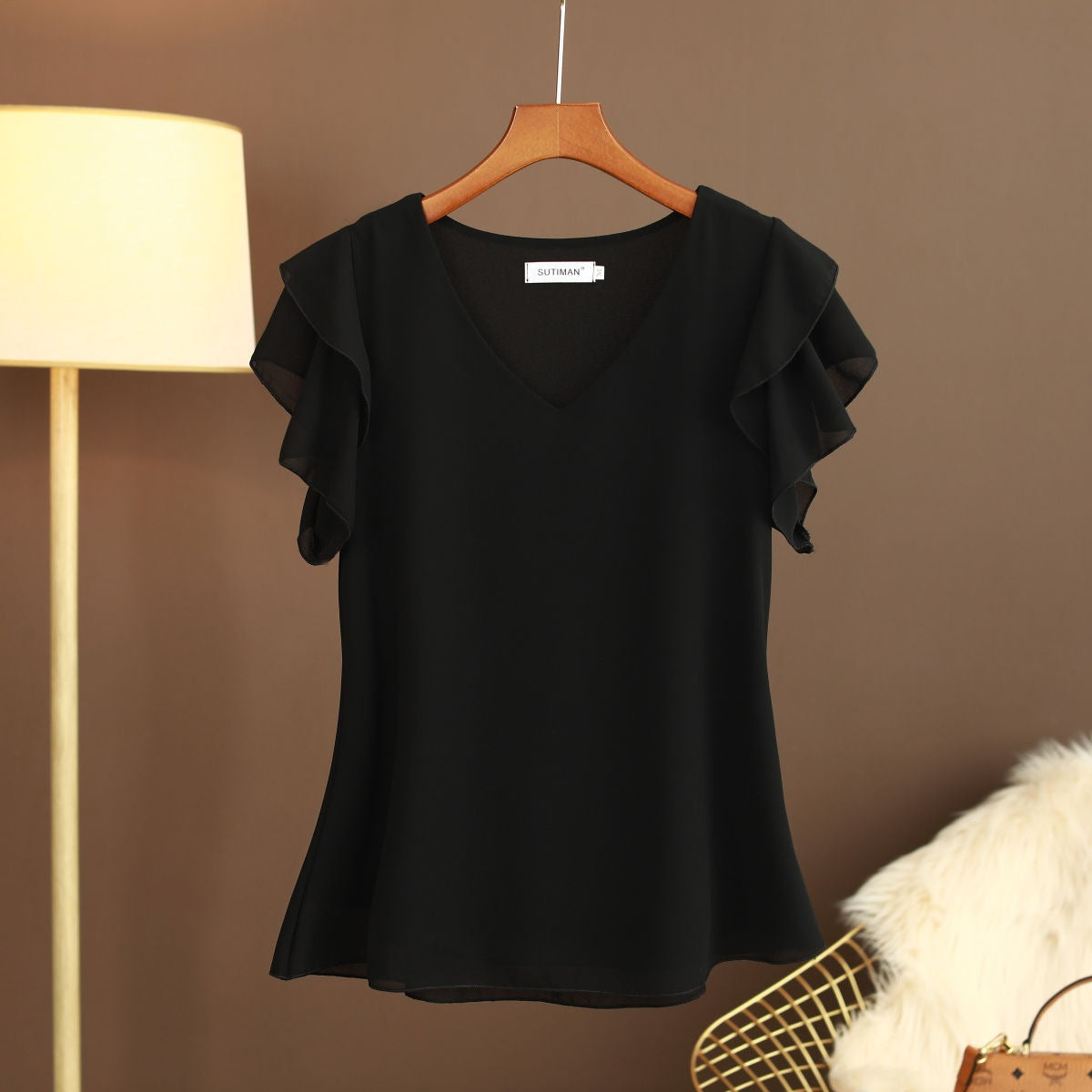 Blusa de mujer gasa ligera con volantes y escote pico